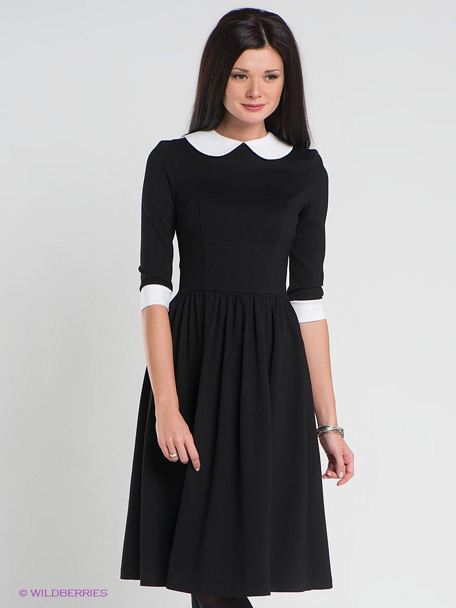 Черное платье с бантом на спине