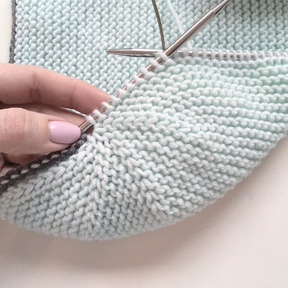 Шапка поворотными рядами