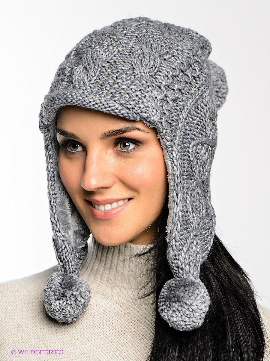 Вязаная шапка-ушанка спицами женская