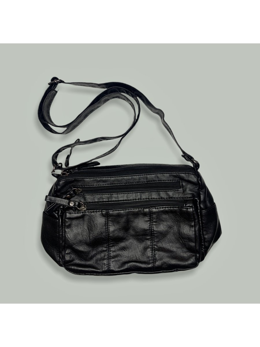 Вышивка на кожаной сумке