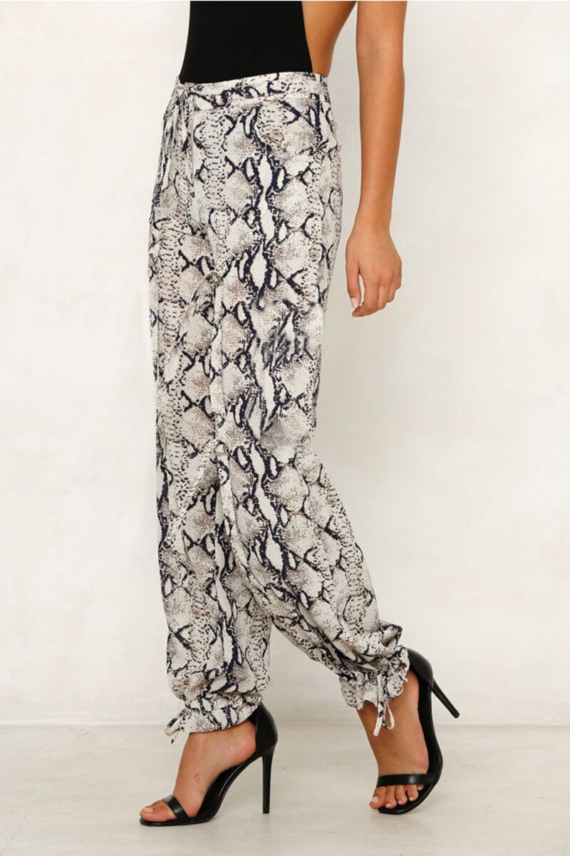 Zara джинсы со змеиным принтом