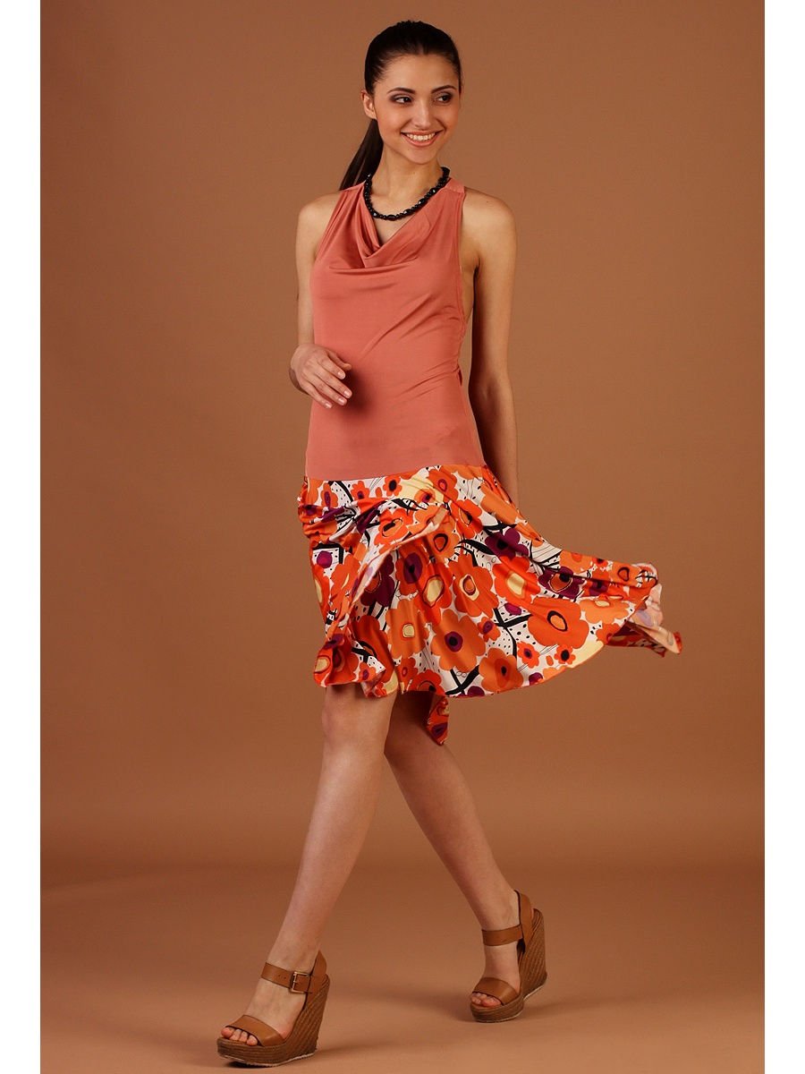 Вечернее платье с вырезом качели