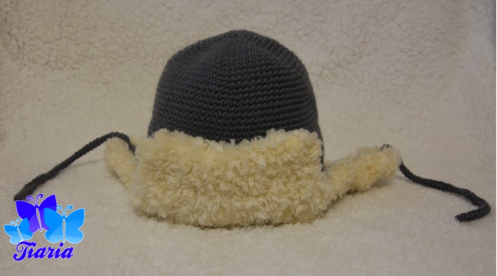 Вязаная шапка ушанка для девочки
