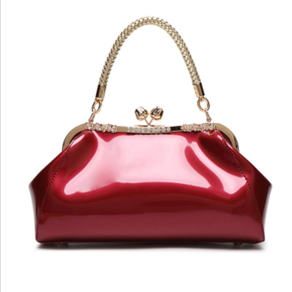 Клатч coach Kisslock