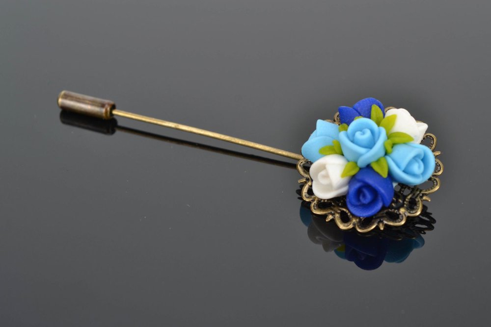 Брошь куколка из полимерной глины